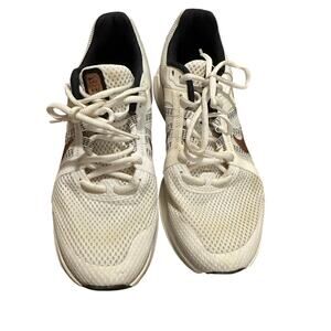 Nike Women's Run Swift 2 running sneakers in a white colorway rose gold accents